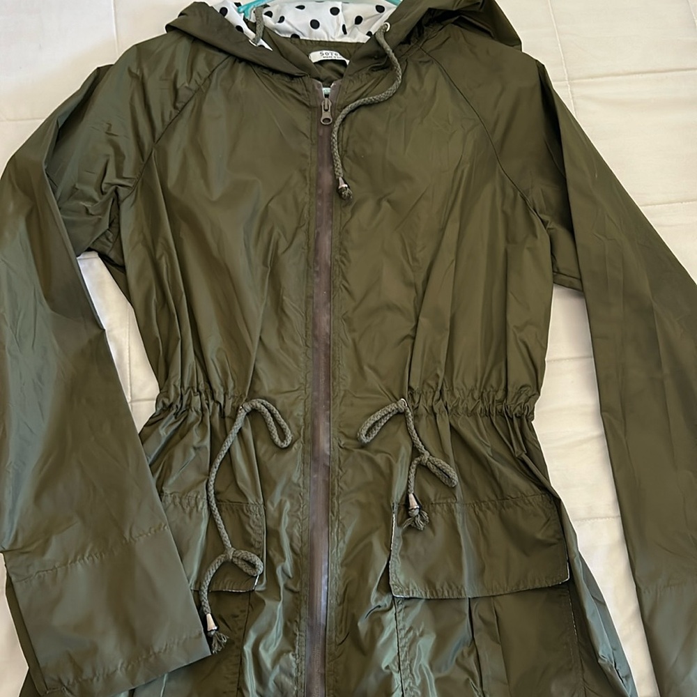 Green rain jacket